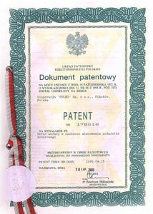 Patent Układ ważący w systemie sterowania podajnika komorowego.